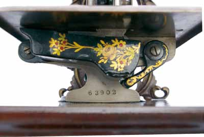 The serial No. 63902 dates this early machine to around 1864, which is the patent date on the stitchplate